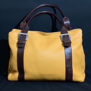 Deep yellow leather purse with brown leather trim
